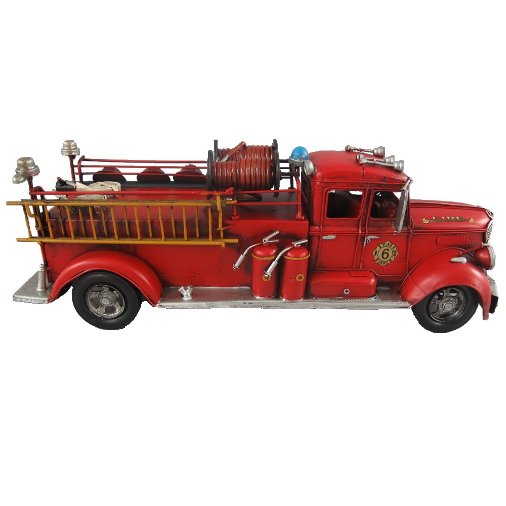 Altes Uhrwerk Blechspielzeug-Auto mit Schlüssel zum Aufziehen gemalt als  Feuerwehr-Fahrzeug Stockfotografie - Alamy